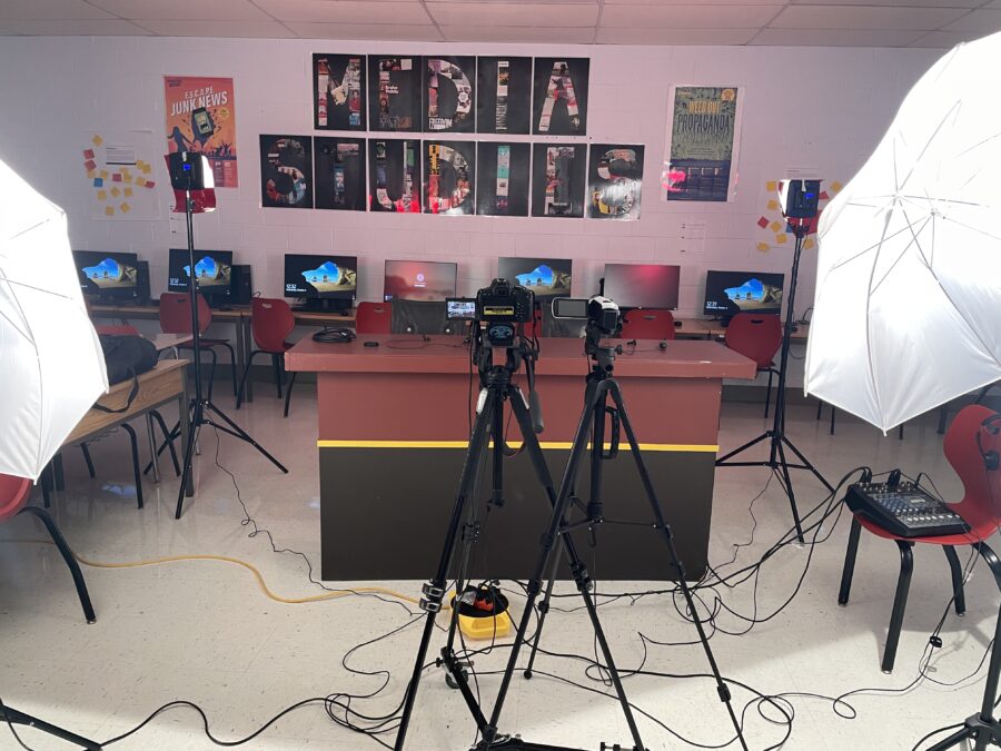 The Media Production & Digital Storytelling program prepares to record their bi-weekly news program, Red Hawk News.