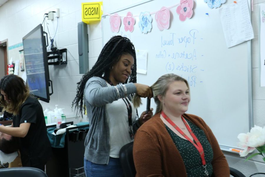 Mrs. Alyssa Keen getting her hair styled by Ava Garris.